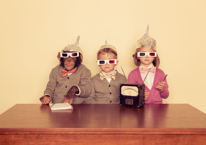 Young Children and Chimpanzee wear Tinfoil Hats